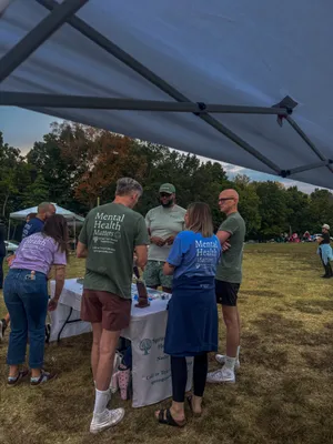 We love our shirts This was at a local community event where we were advertising