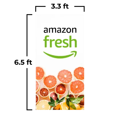 3.3 x 6.5 ft A vertical banner displays the 'Amazon Fresh' logo above a selection of vibrant citrus fruit slices, suggesting fresh produce availability.