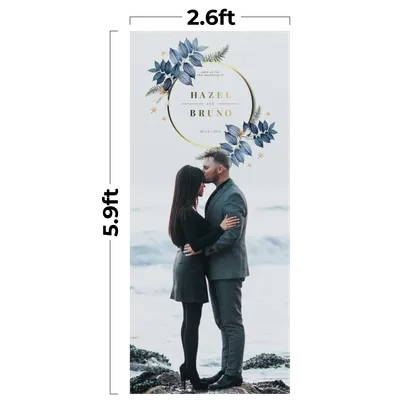 2.6 x 5.9 ft A couple embraces on a banner for an event, surrounded by floral graphics, with names 'HAZEL & BRUNO' and date 'MAY 29 2022' featured prominently.